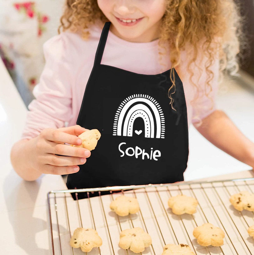 Kinderschürze mit Namen - personalisiert - blau pink türkis lila oder schwarz - Design Regenbogen