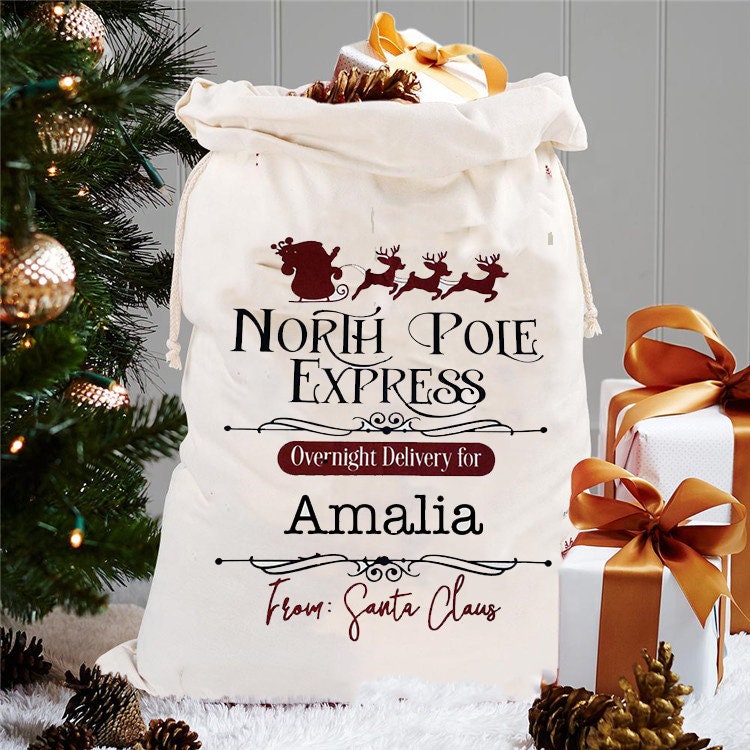 Nikolaussack Weihnachtsmann Sack Geschenkbeutel Weihnachten Jutesack groß Santa personalisiert mit Namen - North Pole Express