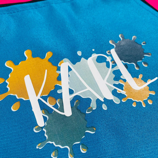 Kinderschürze personalisiert mit Farbklecksen und Name, zum Backen, Basteln und Gärtnern - Wunschname und Schriftart - 7 Farben