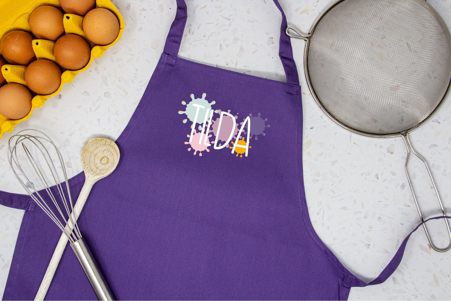 Kinderschürze personalisiert mit Farbklecksen und Name, zum Backen, Basteln und Gärtnern - Wunschname und 7 Farben - Kleckse Mädchen