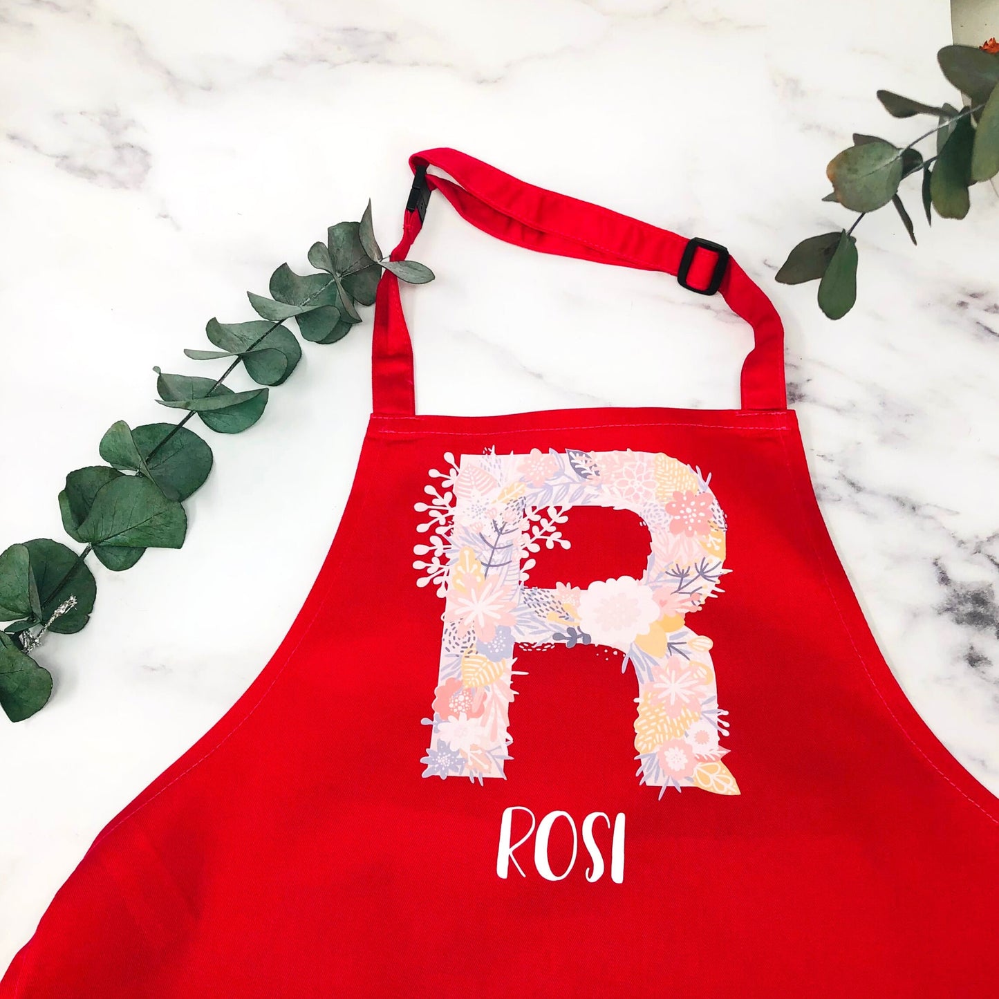 Kinderschürze personalisiert mit Initial und Name, zum Backen, Basteln und Gärtnern - Wunschname und 6 Farben - Floral