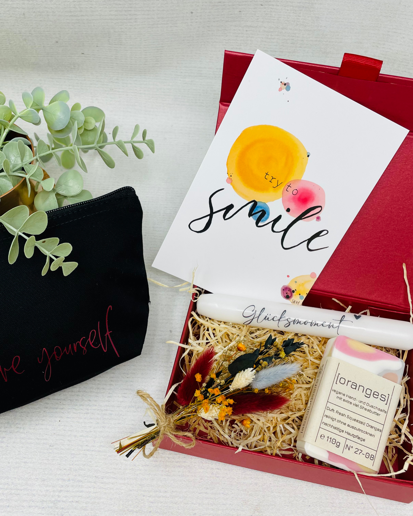 Glücksmomente erleben - mit Seife Oranges , Kerze und Kosmetiktasche - Geschenkbox im Set