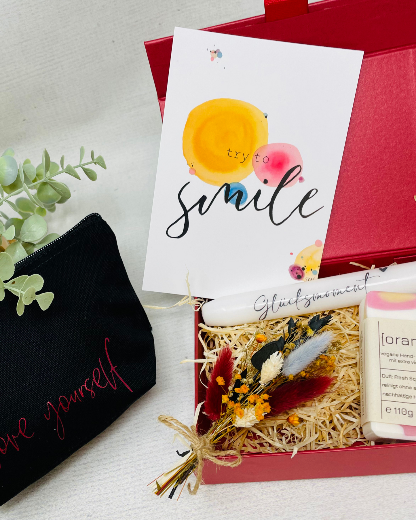 Glücksmomente erleben - mit Seife Oranges , Kerze und Kosmetiktasche - Geschenkbox im Set