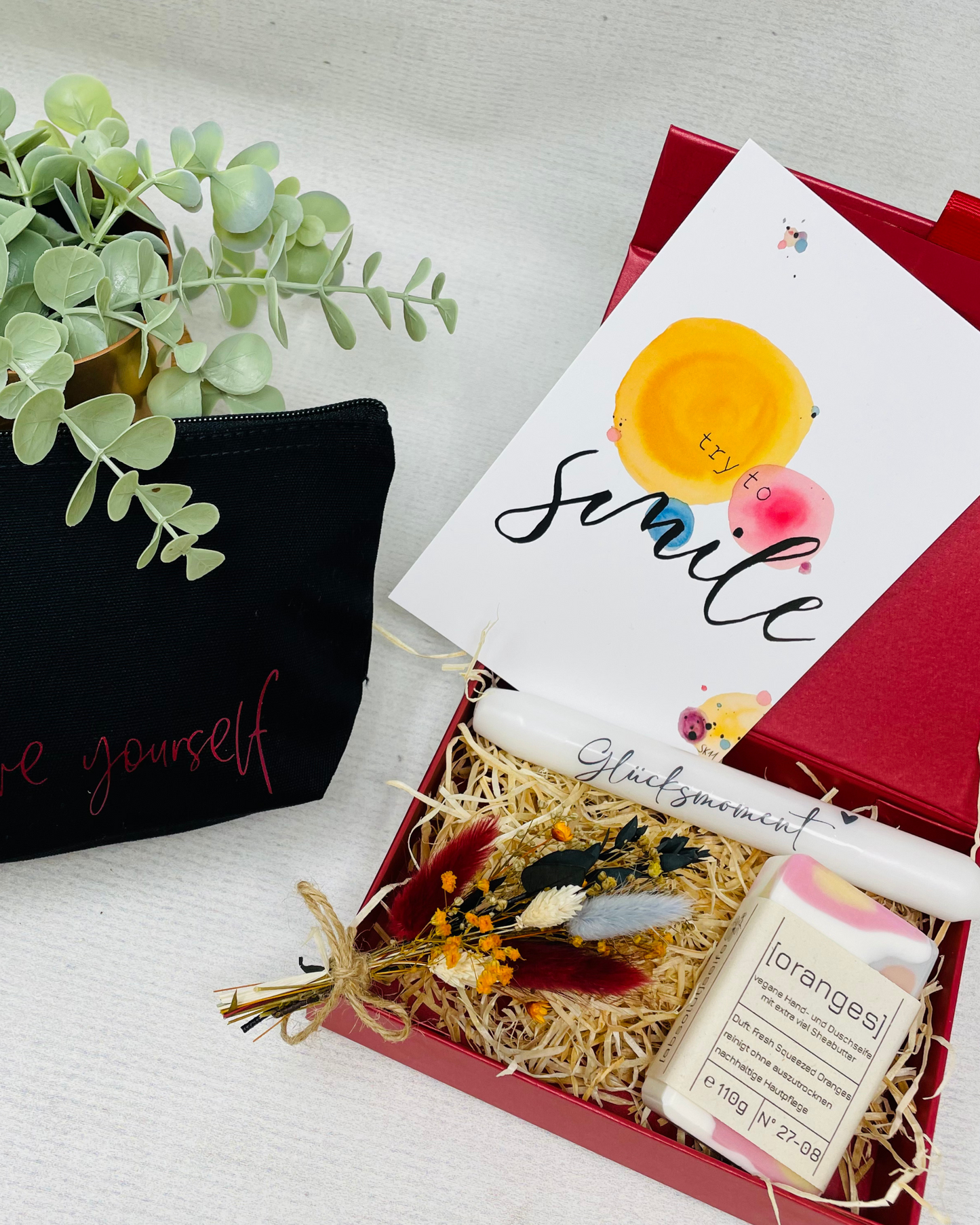 Glücksmomente erleben - mit Seife Oranges , Kerze und Kosmetiktasche - Geschenkbox im Set